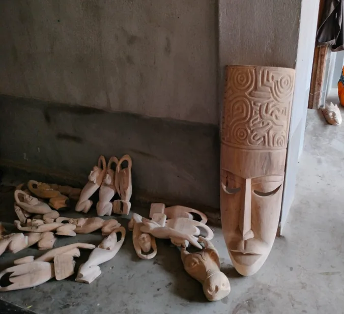 Unfinished Gomira masks at a workshop in Kushmandi